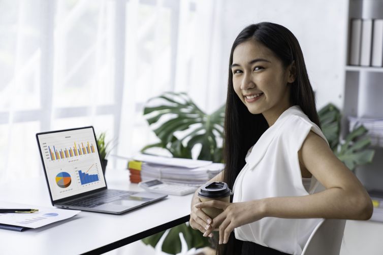 beautiful-asian-businesswoman-working-on-laptop-at-2025-02-19-06-21-52-utc